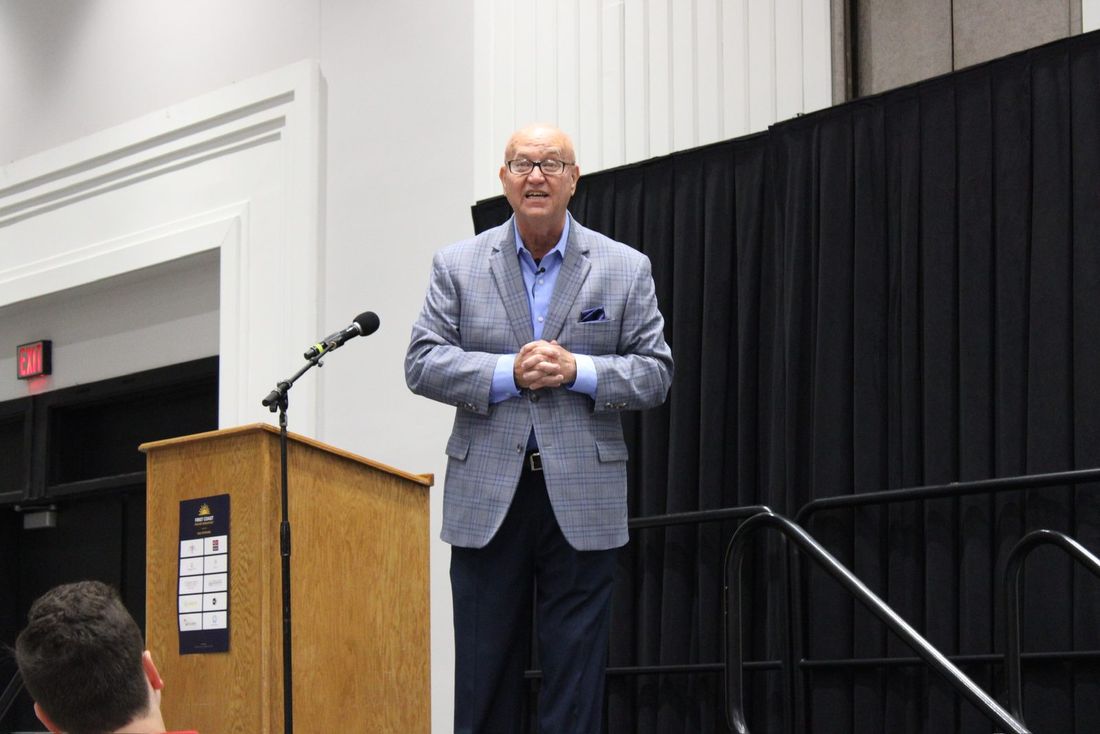 Mark Whitacre speaking from the stage